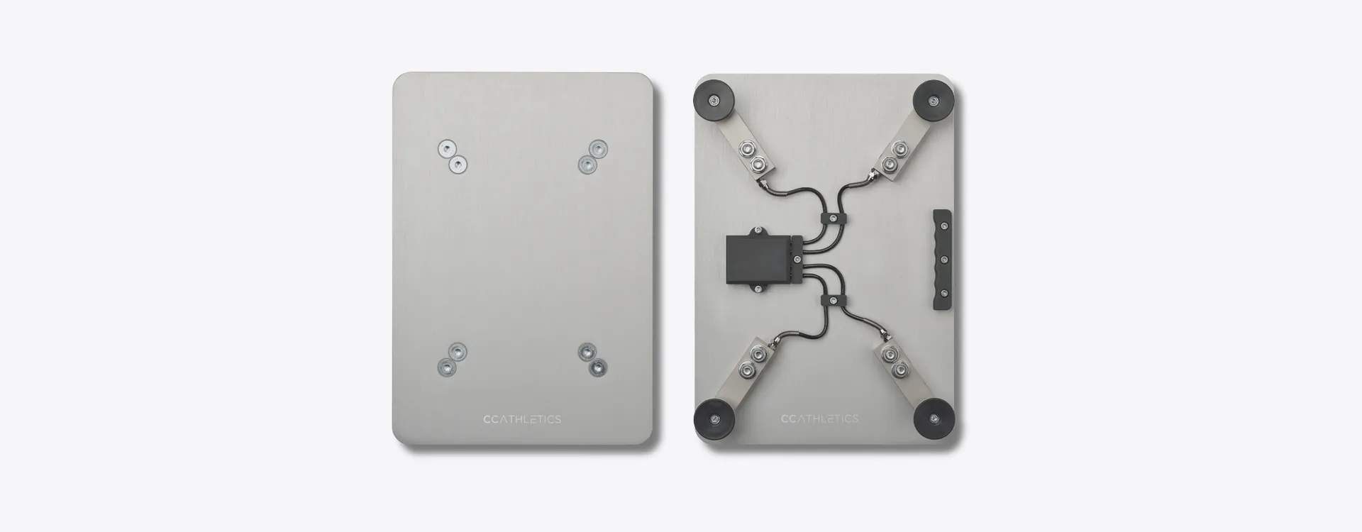 Two PlateMate force plates seen from above — one from the top, one showing the load cells and wireless module underneath